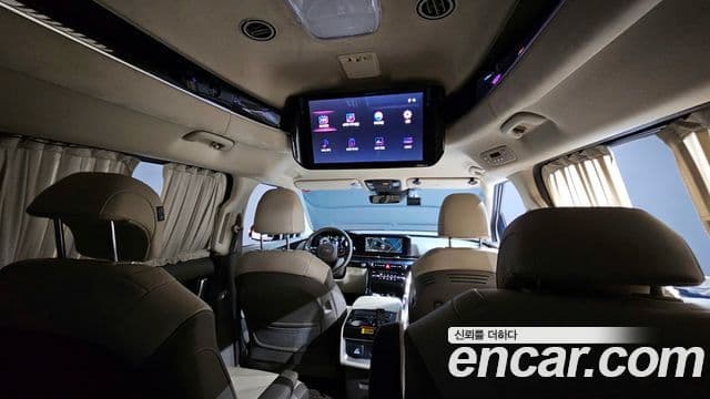 Kia Carnival 2021 — ფოტო 18/20