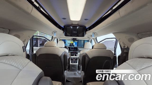 Kia Carnival 2021 — ფოტო 14/20