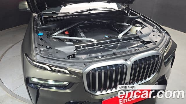 BMW X7 2023 — ფოტო 6/20