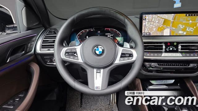 BMW X4 2022 — ფოტო 14/20