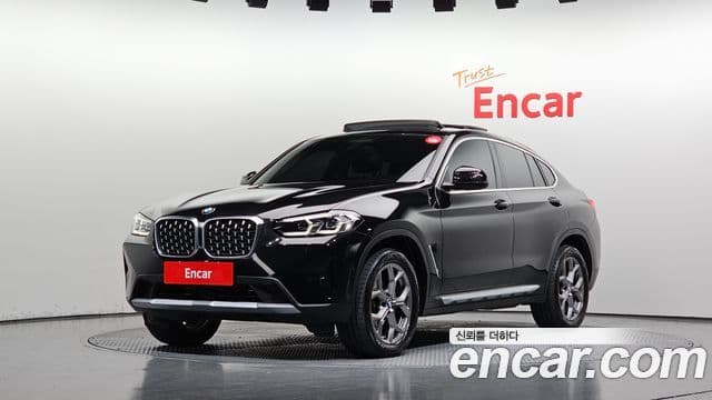 BMW X4 2023 — ფოტო 1/20