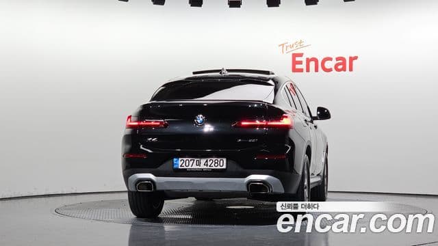 BMW X4 2023 — ფოტო 4/20