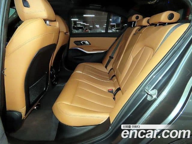 BMW 3 Series 2022 — фото 10 из 19