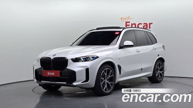 BMW X5 2025 — ფოტო 32/34