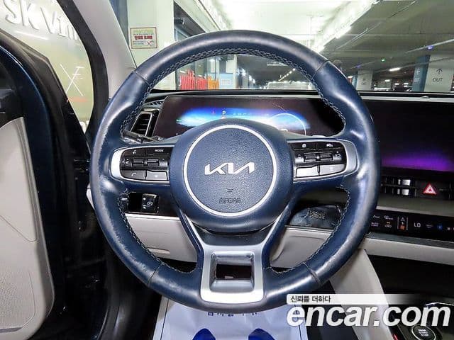 Kia Sportage 2021 — ფოტო 17/20