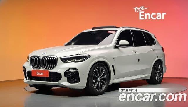 BMW X5 2021 — ფოტო 15/30