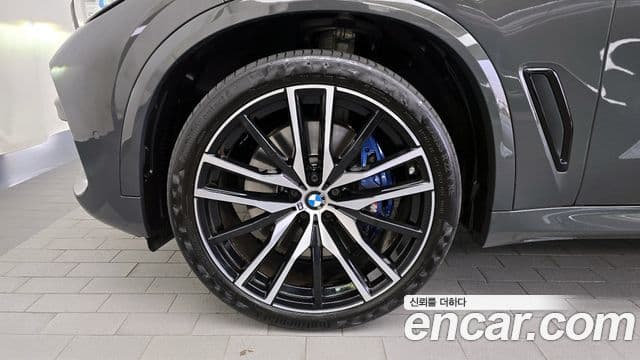 BMW X5 2023 — ფოტო 4/20