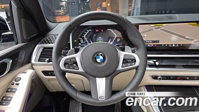BMW X5 2025 — ფოტო 13/20