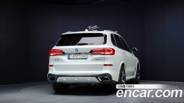 BMW X5 2022 — ფოტო 4/20