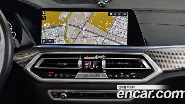 BMW X5 2022 — ფოტო 14/20