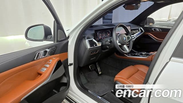 BMW X7 2024 — Фото 10/20