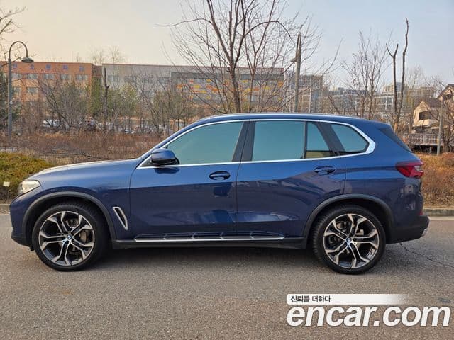 BMW X5 2021 — ფოტო 9/18