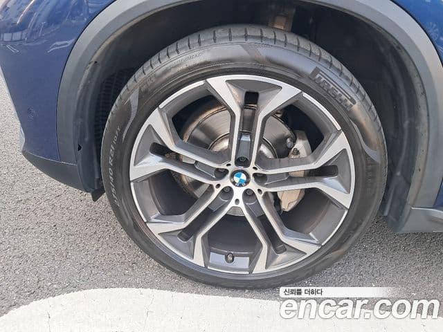 BMW X5 2021 — ფოტო 11/18