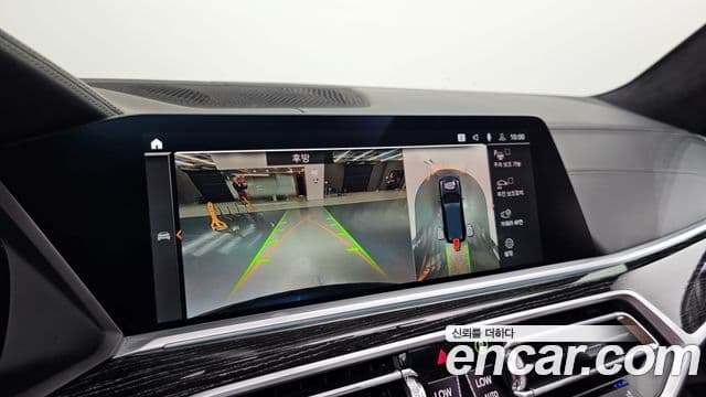 BMW X7 2022 — ფოტო 14/20
