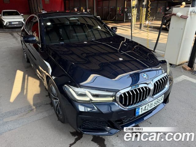 BMW 5 Series 2023 — ფოტო 16/16