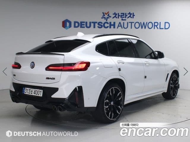 BMW X4 2022 — Фото 1/3