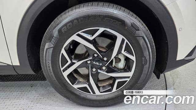 Kia Sportage 2021 — ფოტო 5/20