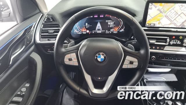 BMW X4 2022 — ფოტო 13/20