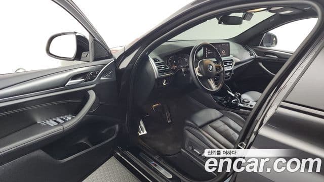 BMW X4 2022 — Фото 10/20