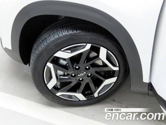 Kia Seltos 2024 — ფოტო 18/20