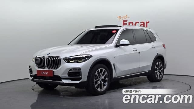 BMW X5 2019 — ფოტო 1/20