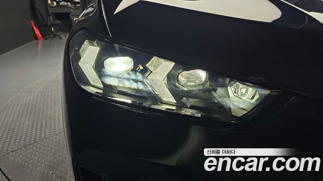 BMW X5 2023 — ფოტო 15/32