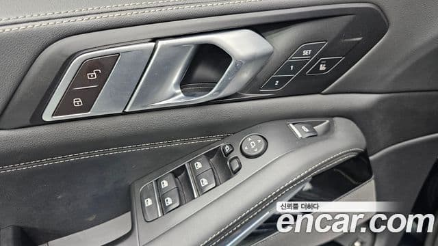 BMW X5 2023 — ფოტო 29/32