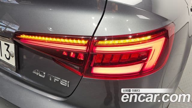 Audi A4 2019 — ფოტო 3/30
