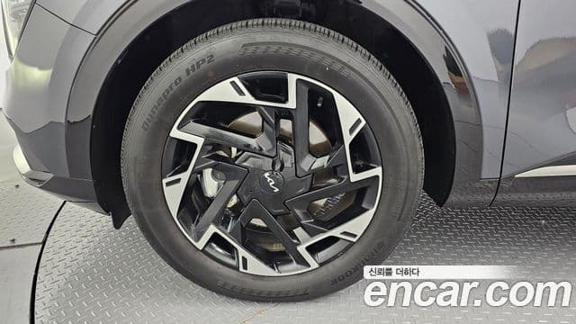 Kia Sportage 2021 — ფოტო 5/20