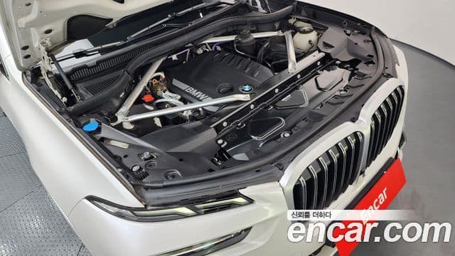 BMW X7 2023 — ფოტო 6/20