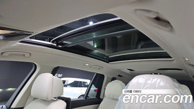 BMW X7 2021 — ფოტო 18/20
