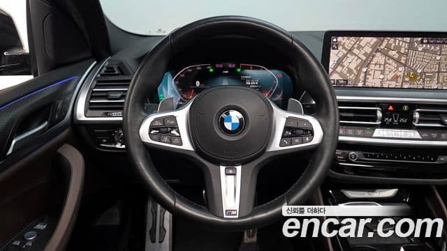 BMW X4 2022 — Фото 12/20
