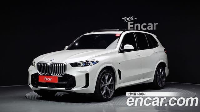 BMW X5 2024 — Фото 1/20