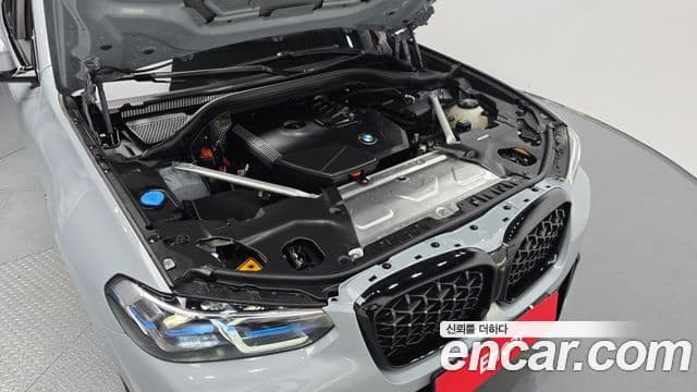 BMW X4 2022 — ფოტო 6/20
