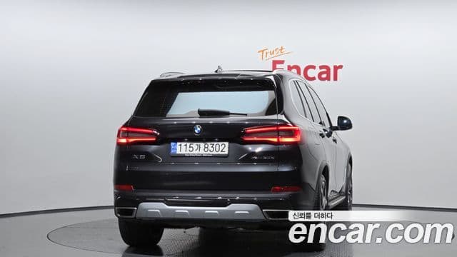BMW X5 2023 — ფოტო 4/20