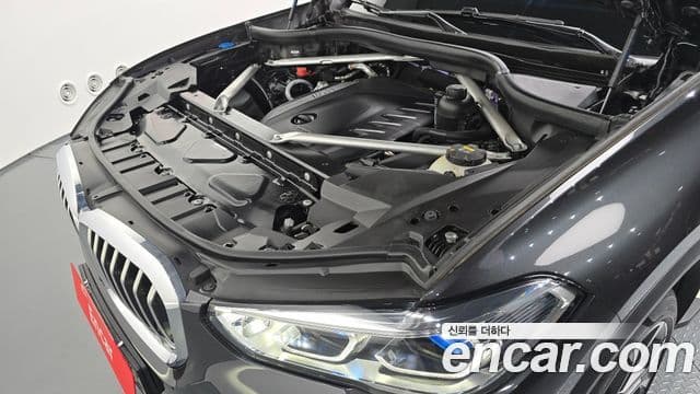 BMW X5 2023 — ფოტო 6/20
