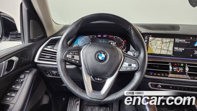 BMW X5 2021 — ფოტო 9/20