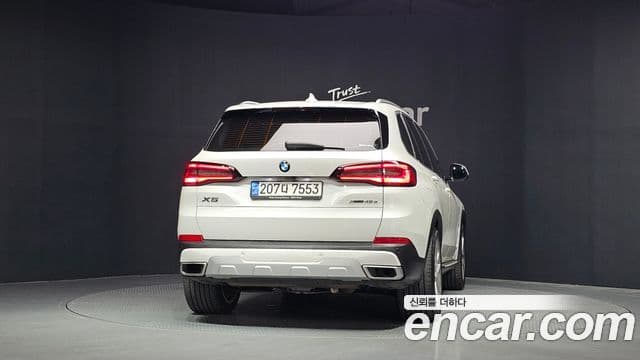 BMW X5 2021 — ფოტო 4/20