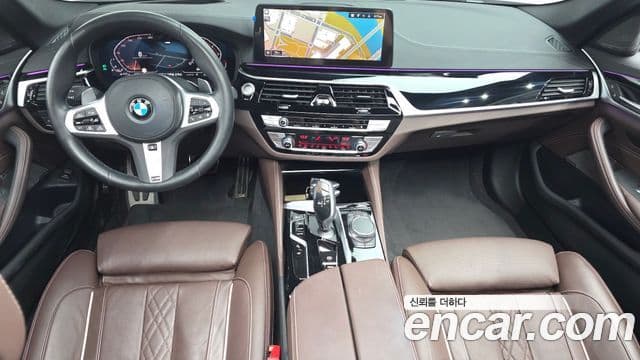 BMW 5 Series 2023 — ფოტო 7/20