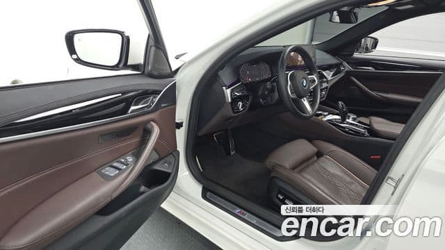 BMW 5 Series 2023 — ფოტო 10/20