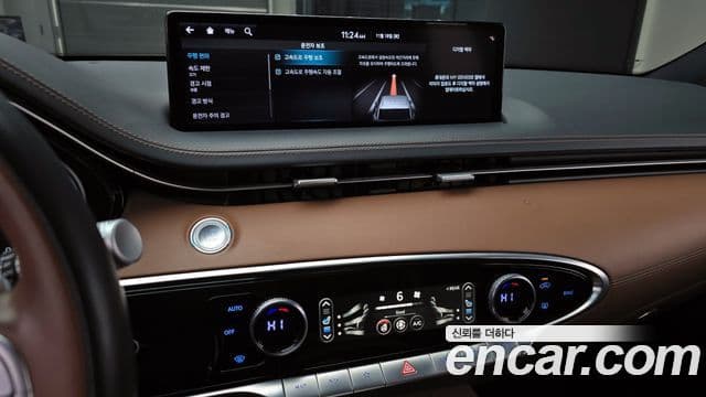 Genesis GV70 2021 — ფოტო 16/20