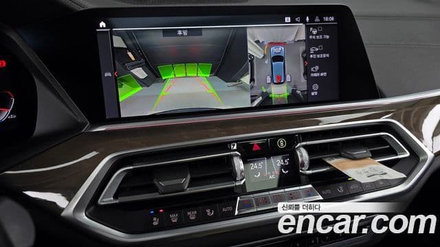 BMW X5 2021 — ფოტო 15/20
