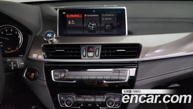 BMW X1 2021 — ფოტო 15/20