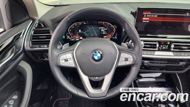 BMW X4 2023 — ფოტო 13/20