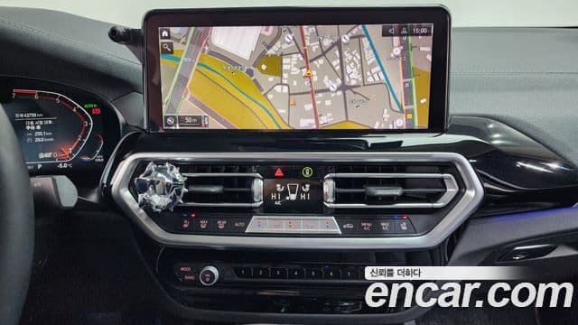 BMW X4 2023 — ფოტო 15/20