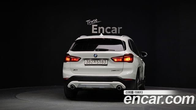 BMW X1 2022 — ფოტო 4/20