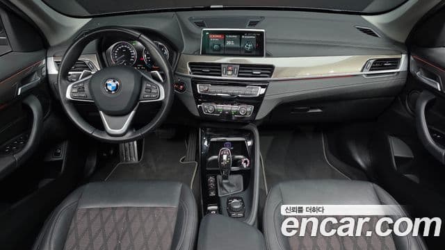 BMW X1 2021 — ფოტო 7/20