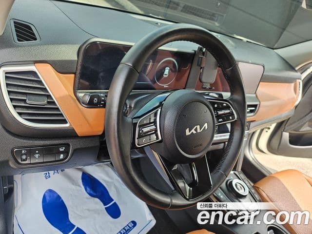 Kia Seltos 2023 — ფოტო 15/20