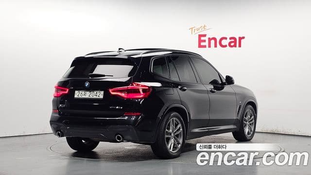 BMW X3 2019 — ფოტო 1/34