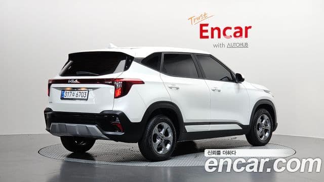 Kia Seltos 2023 — Şəkil 1/20